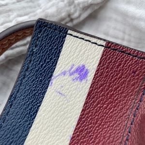 Tory Burch Tote w/interior ink stain)